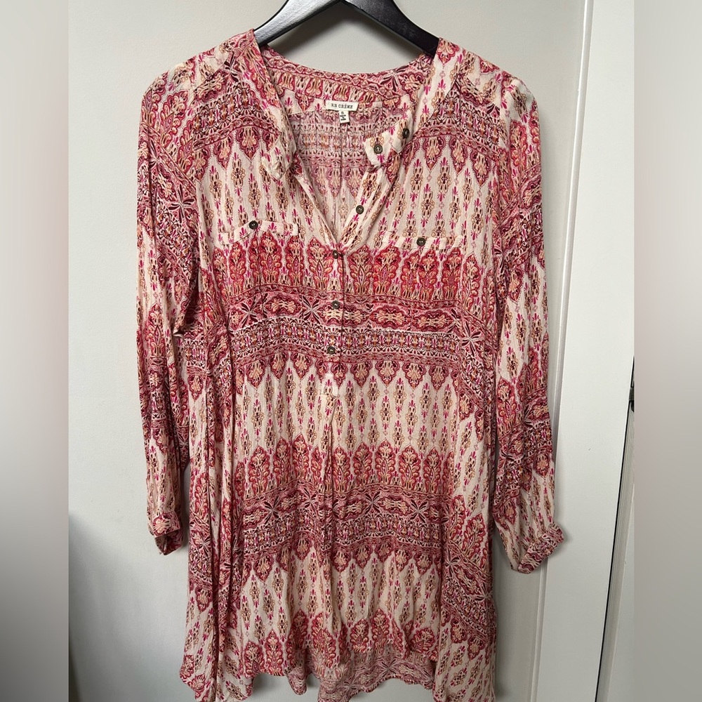 Women’s adorable multi colored baby doll type top.